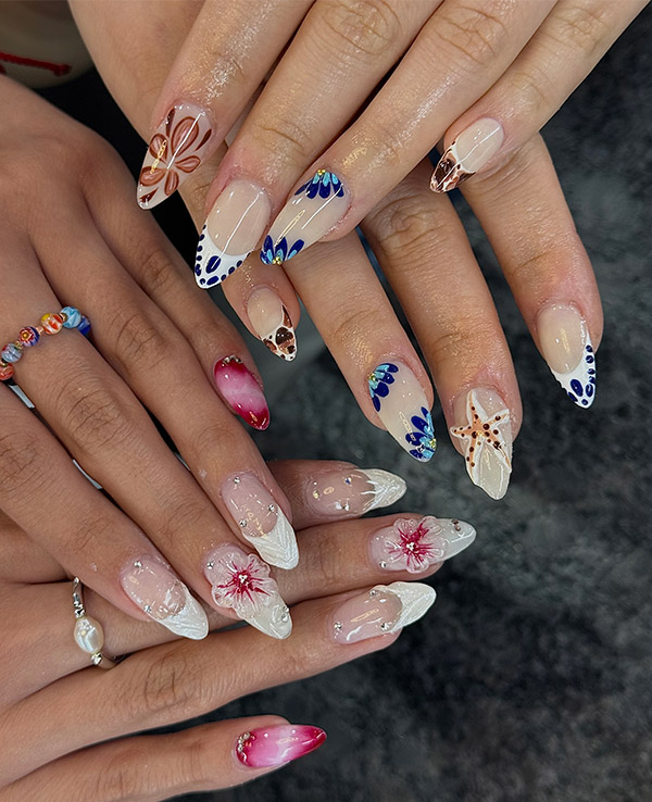Detailed floral and ocean-inspired nail art examples