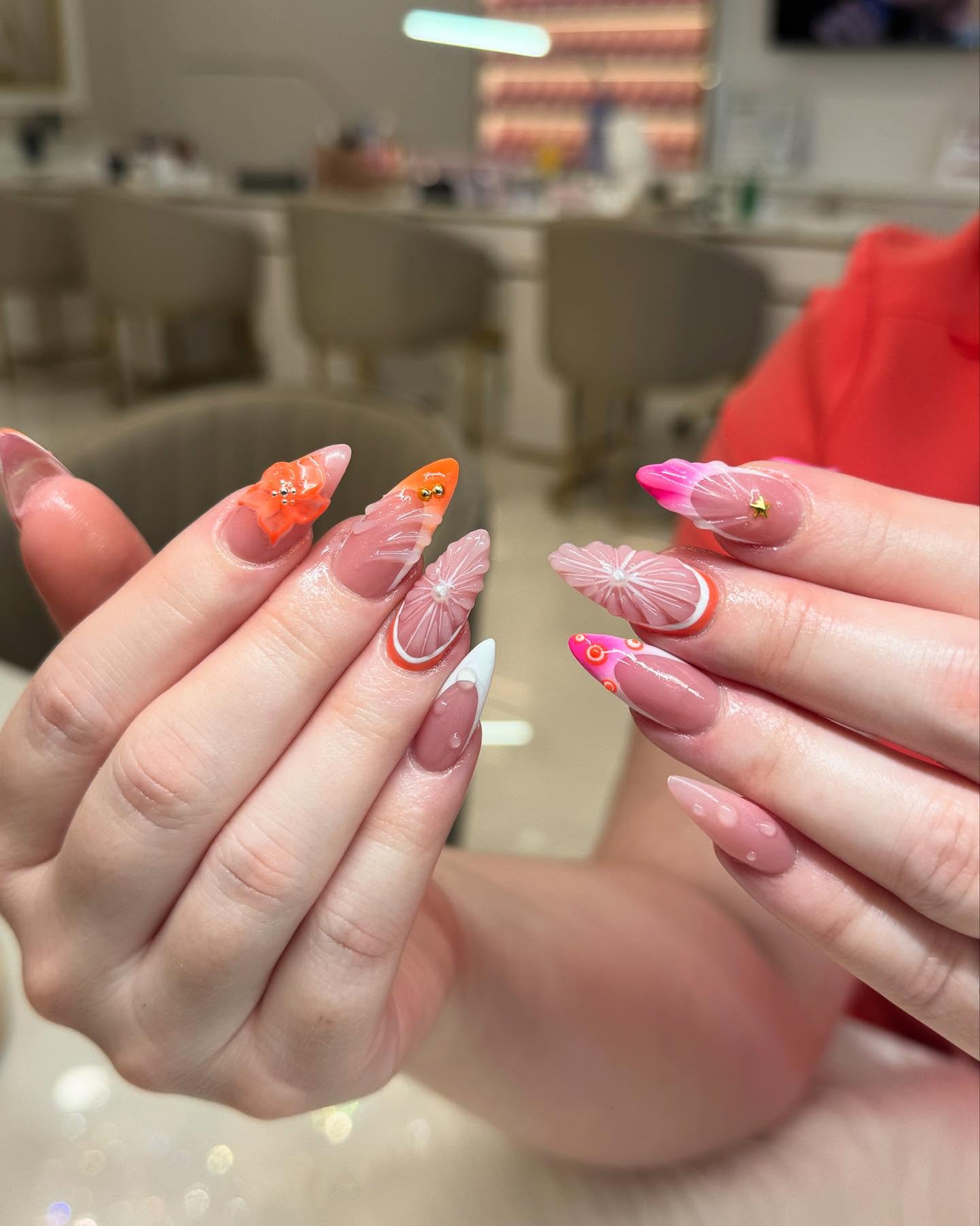 Bright pink and orange dimensional floral nail art